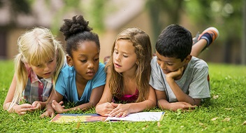 School kids play outside